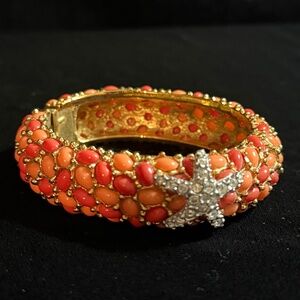 Kenneth Jay Lane KJL Orange And Gold Hinged Bangle Bracelet With Rhinestone Star